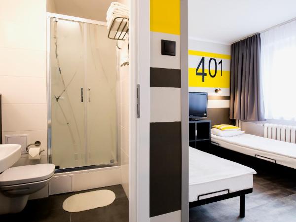 Aramis : photo 1 de la chambre chambre familiale avec salle de bains privative