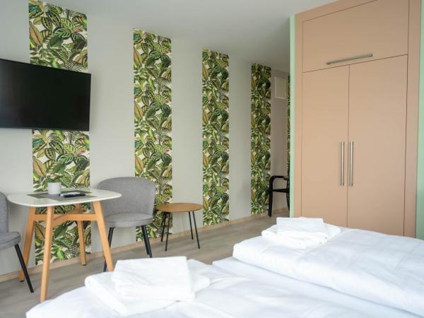 Anton Apartmanház : photo 2 de la chambre chambre double ou lits jumeaux supérieure