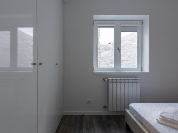 Dona Emília Guest House & Studio Apartment Building : photo 10 de la chambre appartement - vue sur jardin