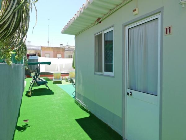 Guest House Sao Filipe : photo 3 de la chambre chambre triple