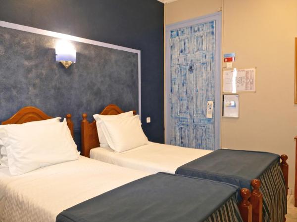 Guest House Sao Filipe : photo 10 de la chambre chambre lits jumeaux