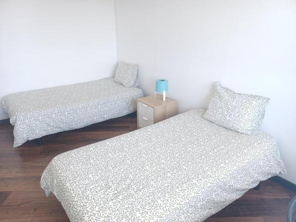 Oporto Sea Rooms : photo 7 de la chambre chambre lits jumeaux avec salle de bains commune