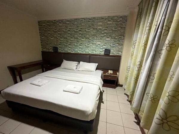 Lady Anne Hotel Sandkan : photo 2 de la chambre chambre lit king-size deluxe