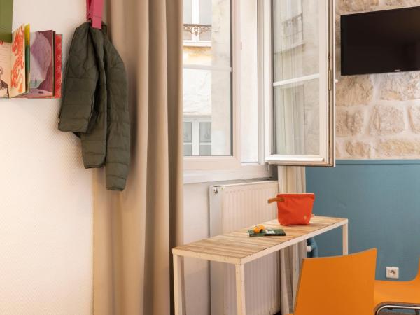 Le Regent Montmartre by Hiphophostels : photo 4 de la chambre chambre quadruple