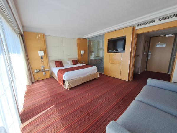 Le Churchill Hôtel & Spa : photo 1 de la chambre chambre lit king-size - accessible aux personnes à mobilité réduite