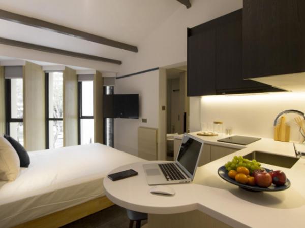 Coliwoo Keppel - CoLiving : photo 1 de la chambre king studio suite (k5)
