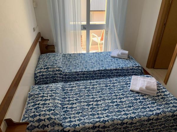 Hotel Estense : photo 9 de la chambre chambre double ou lits jumeaux