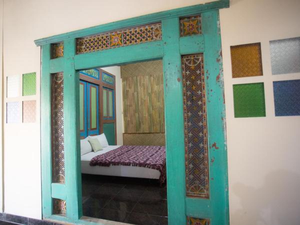 Rumah Kalpataru : photo 3 de la chambre chambre double avec lit d'appoint