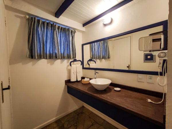 Taman Búzios Hotel : photo 7 de la chambre chambre quadruple de luxe