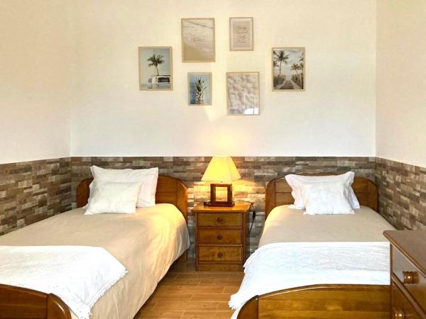 Colina do Elétrico : photo 2 de la chambre chambre double ou lits jumeaux - vue sur mer