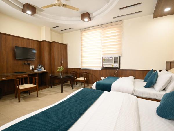 Hotel Baba Deluxe at New Delhi Railway Station -By RCG Hotels : photo 3 de la chambre suite familiale deluxe