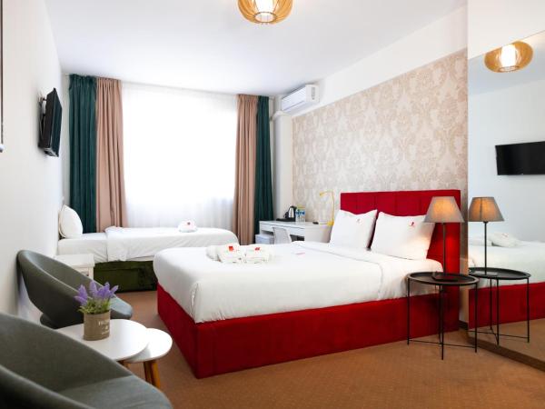 City Plaza Apartments & Rooms : photo 1 de la chambre chambre triple supérieure