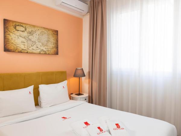 City Plaza Apartments & Rooms : photo 3 de la chambre chambre confortable