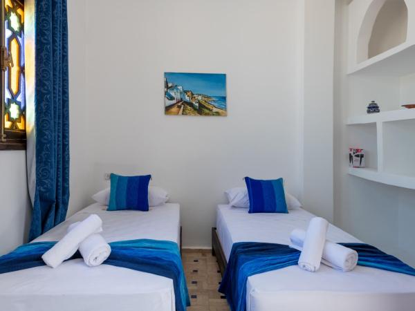 Riad SULTANA : photo 2 de la chambre chambre lits jumeaux