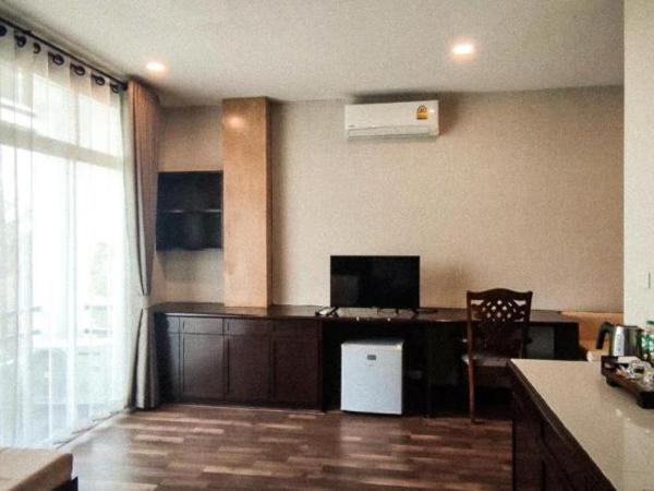 ANANTAYA CHIANGMAI BOUTIQUE HOTEL : photo 8 de la chambre chambre lit king-size - vue sur jardin