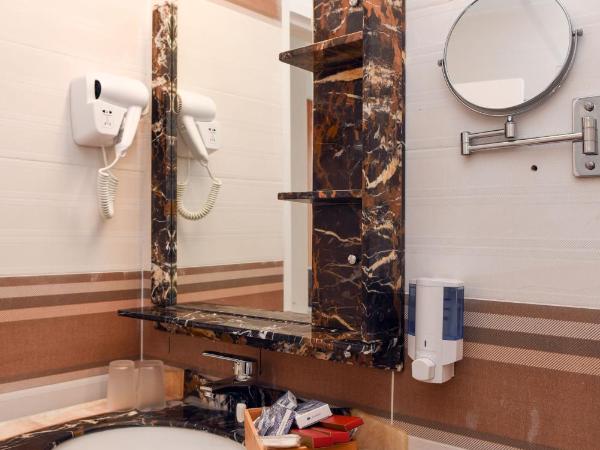 Muthu Clube Praia da Oura : photo 5 de la chambre appartement 1 chambre - vue sur jardin (2 adultes)