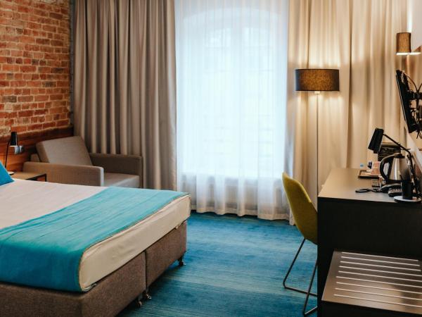 Hotel Tobaco Łódź : photo 6 de la chambre chambre double standard avec lit king-size