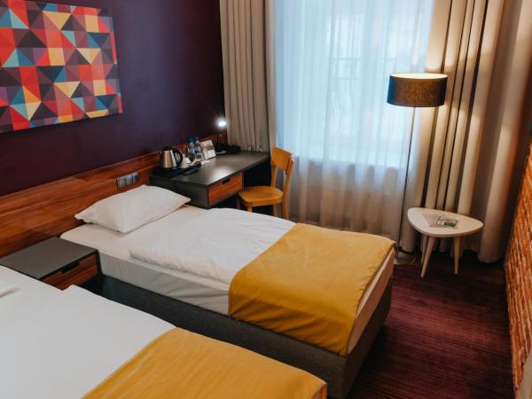 Hotel Tobaco Łódź : photo 2 de la chambre petite chambre double