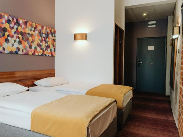Hotel Tobaco Łódź : photo 3 de la chambre petite chambre double