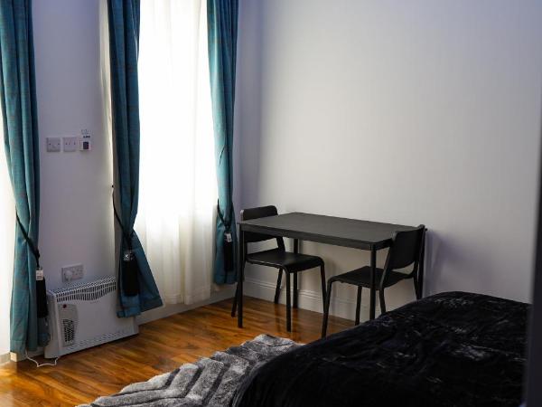 S.H Apartments : photo 5 de la chambre superior studio with garden access/projector screen