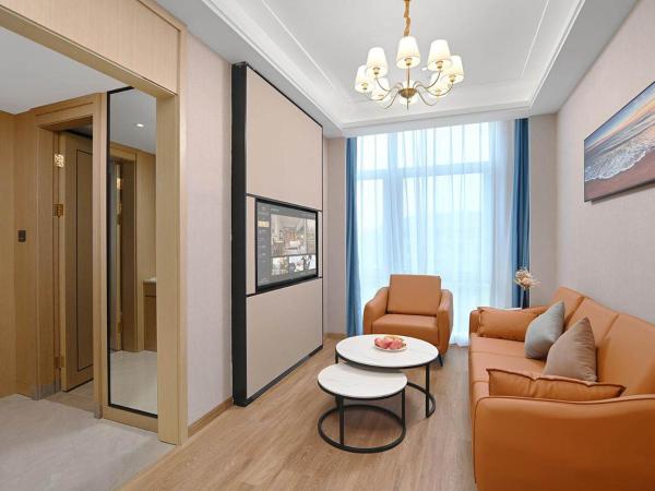 Vienna International Hotel Chongqing Central Park 5 0 : photo 2 de la chambre suite affaires