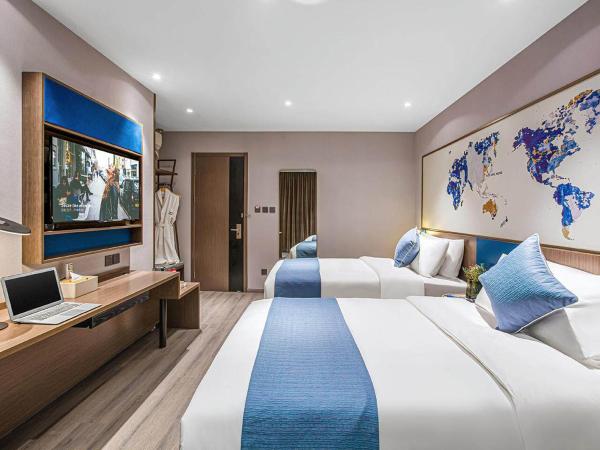 Kyriad Marvelous Hotel Wuxi Zhongshan Road Chong'an Temple : photo 3 de la chambre chambre lits jumeaux premium - vue sur ville