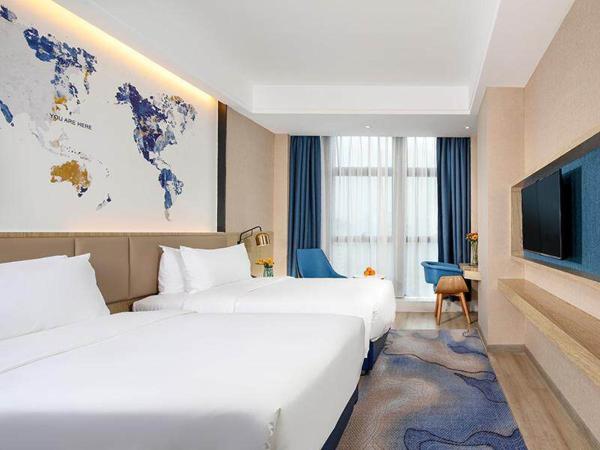 Kyriad Marvelous Hotel Chongqing North Railway Station : photo 1 de la chambre chambre lits jumeaux premier