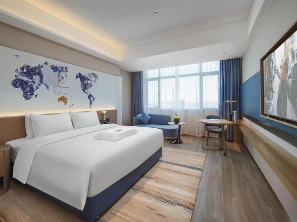 Kyriad Hotel Dongguan Houjie Convention and Exhibition Center Humen Station : photo 2 de la chambre intelligent king room