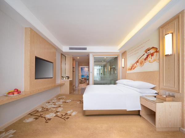 Vienna International Hotel Chongqing Yuanyangyuanboyuan : photo 2 de la chambre chambre familiale deluxe