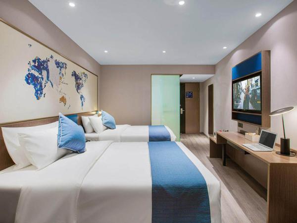 Kyriad Marvelous Hotel Wuxi Zhongshan Road Chong'an Temple : photo 5 de la chambre chambre lits jumeaux premium