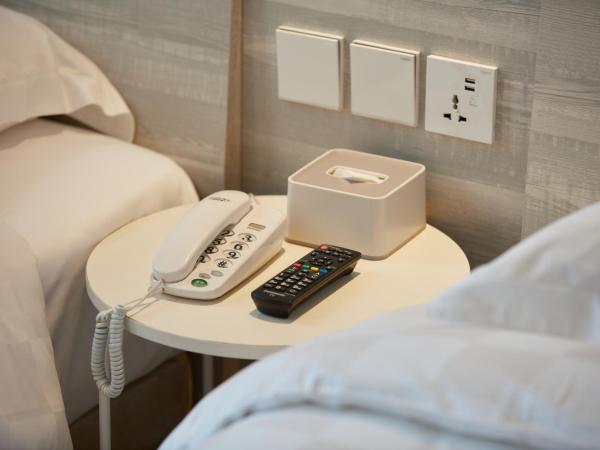 Ole Tai Sam Un Hotel : photo 4 de la chambre chambre lits jumeaux standard