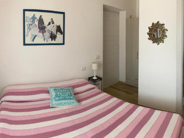 Punta Sirenella : photo 1 de la chambre chambre double ou lits jumeaux avec salle de bains privative