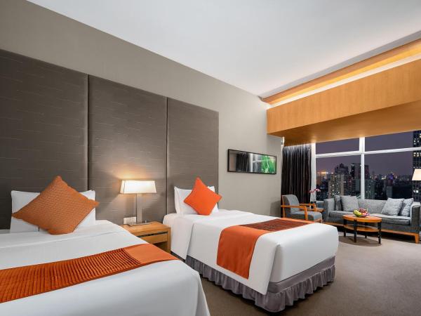 Jianguo Hotel Guangzhou : photo 9 de la chambre chambre lits jumeaux deluxe