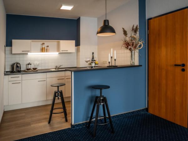 ACHAT Hotel Dresden Altstadt : photo 3 de la chambre appartement avec cuisine