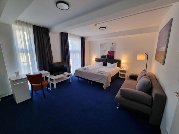 Hotel Seifert Berlin am Kurfürstendamm : photo 6 de la chambre chambre double ou lits jumeaux supérieure avec vue sur ville