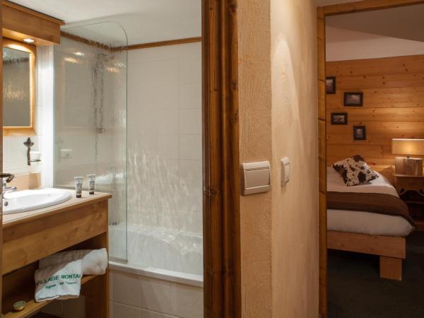 Résidences Village Montana by Les Etincelles : photo 6 de la chambre appartement 3 chambres avec cabine et cheminée