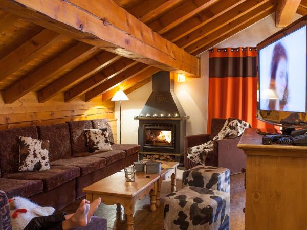 Résidences Village Montana by Les Etincelles : photo 2 de la chambre appartement 3 chambres avec cabine et cheminée