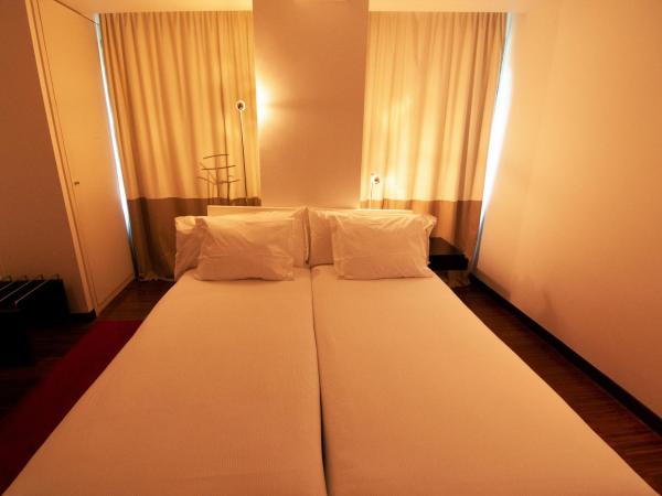 Porto Trindade Hotel : photo 2 de la chambre chambre lits jumeaux