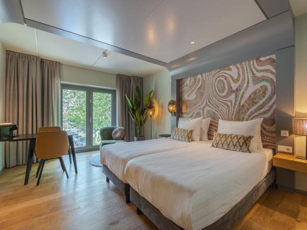 Leonardo Hotel Breda City Center : photo 1 de la chambre chambre lits jumeaux