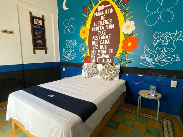 Chuchumbé Hotel & Hostal : photo 1 de la chambre chambre double