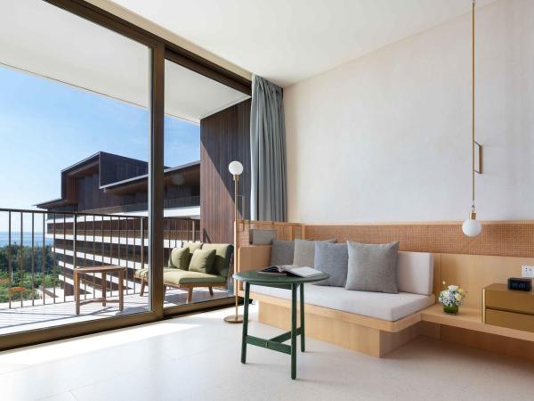 The Taikang Sanya, a Tribute Portfolio Resort : photo 4 de la chambre chambre deluxe avec 2 lits queen-size - vue sur océan