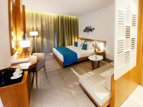 Les Orangers Garden Villas and Bungalows Ultra All inclusive : photo 2 de la chambre chambre double ou lits jumeaux avec balcon