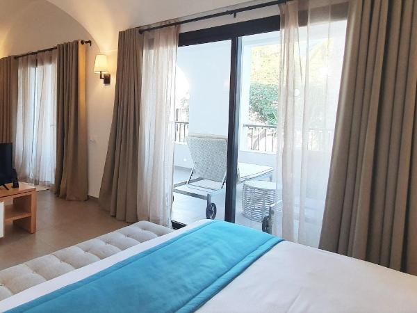 Les Orangers Garden Villas and Bungalows Ultra All inclusive : photo 2 de la chambre chambre double deluxe avec balcon