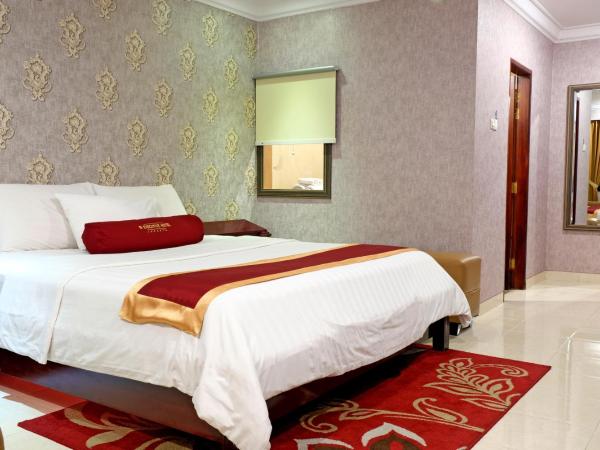 BI Executive Hotel : photo 1 de la chambre suite lit king-size