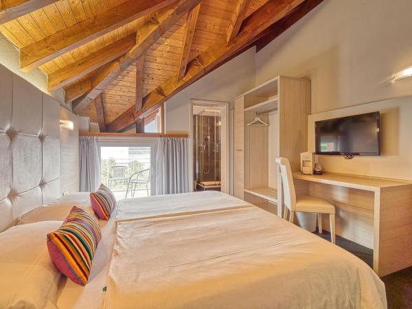 @ Home Hotel Locarno : photo 3 de la chambre chambre triple - vue sur lac