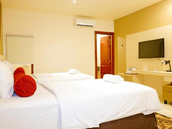 BI Executive Hotel : photo 4 de la chambre chambre lits jumeaux