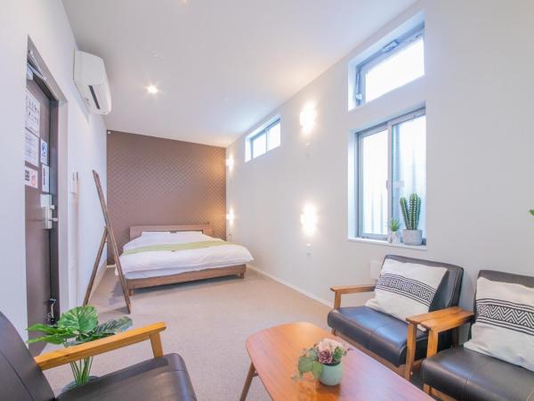 KIZUNA HOTEL Gojo Kiyomizu-dera Kamogawa : photo 1 de la chambre chambre lits jumeaux supérieure - vue sur ville