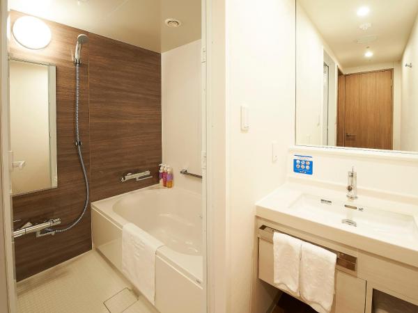 Sotetsu Fresa Inn Kitahama : photo 3 de la chambre chambre lits jumeaux deluxe