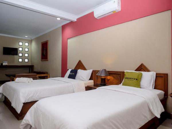 Urbanview Hotel Syariah Wisnugraha by RedDoorz : photo 5 de la chambre chambre familiale deluxe