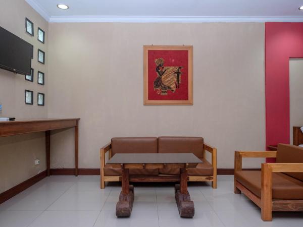 Urbanview Hotel Syariah Wisnugraha by RedDoorz : photo 8 de la chambre chambre familiale deluxe